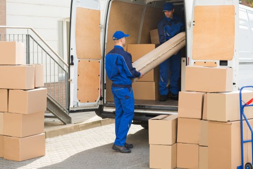 Removal van and team preparing a move in Wandsworth street