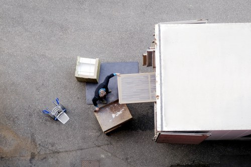 Residential moving boxes and furniture in a Wandsworth home